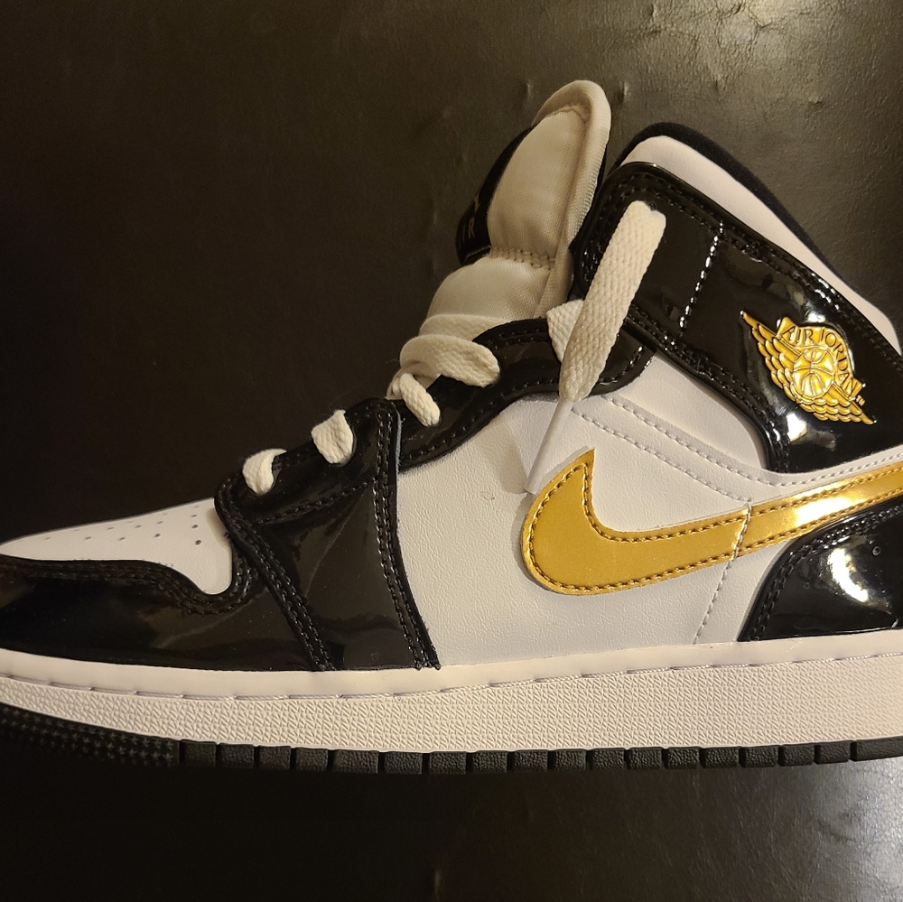 Air Jordan Black and Gold Sneakers